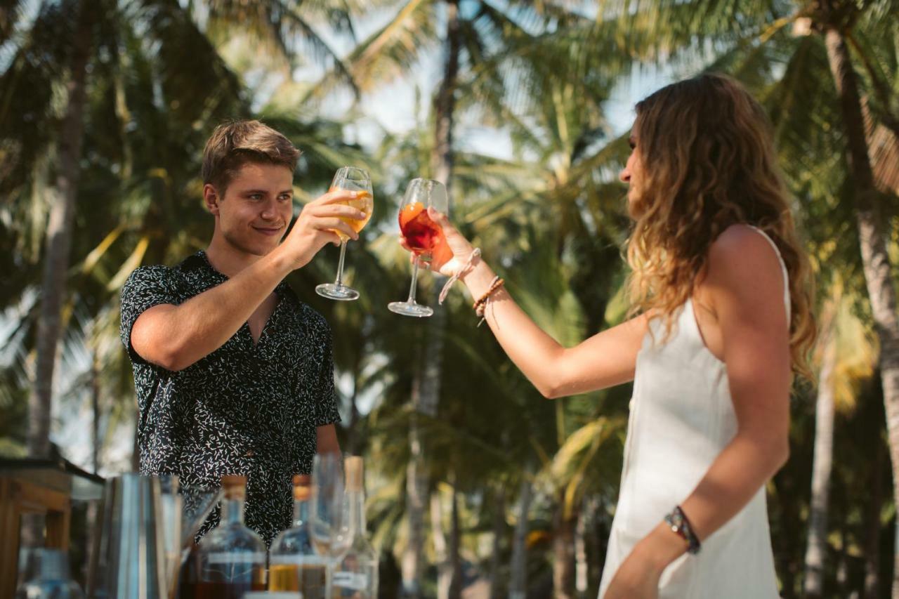 Oceanica Resort Panglao, Bohol Dış mekan fotoğraf Two people toasting with wine